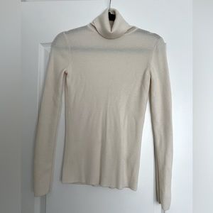 Ivory Long Steve Turtle Neck Sweater from Uniqlo, size S